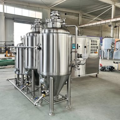 Image of stainless steel fermentation tanks and glycol chiller in the workshop.