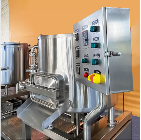 Stainless steel cooking equipment with control panel and buttons.