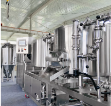 Stainless steel industrial machinery in a clean manufacturing environment.